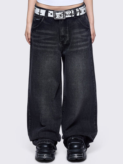 Black washed baggy jeans featuring a "Fallen Angel" winged graphic back print.