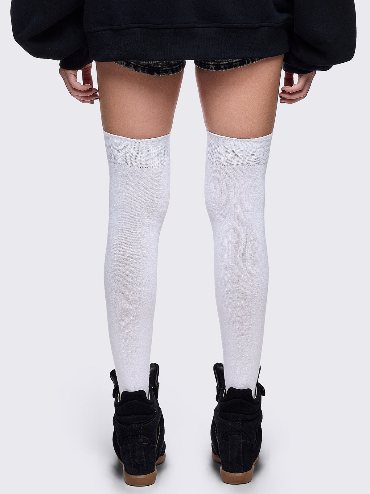 White opaque thigh highs socks with "fallen angel" cross graphic design. 