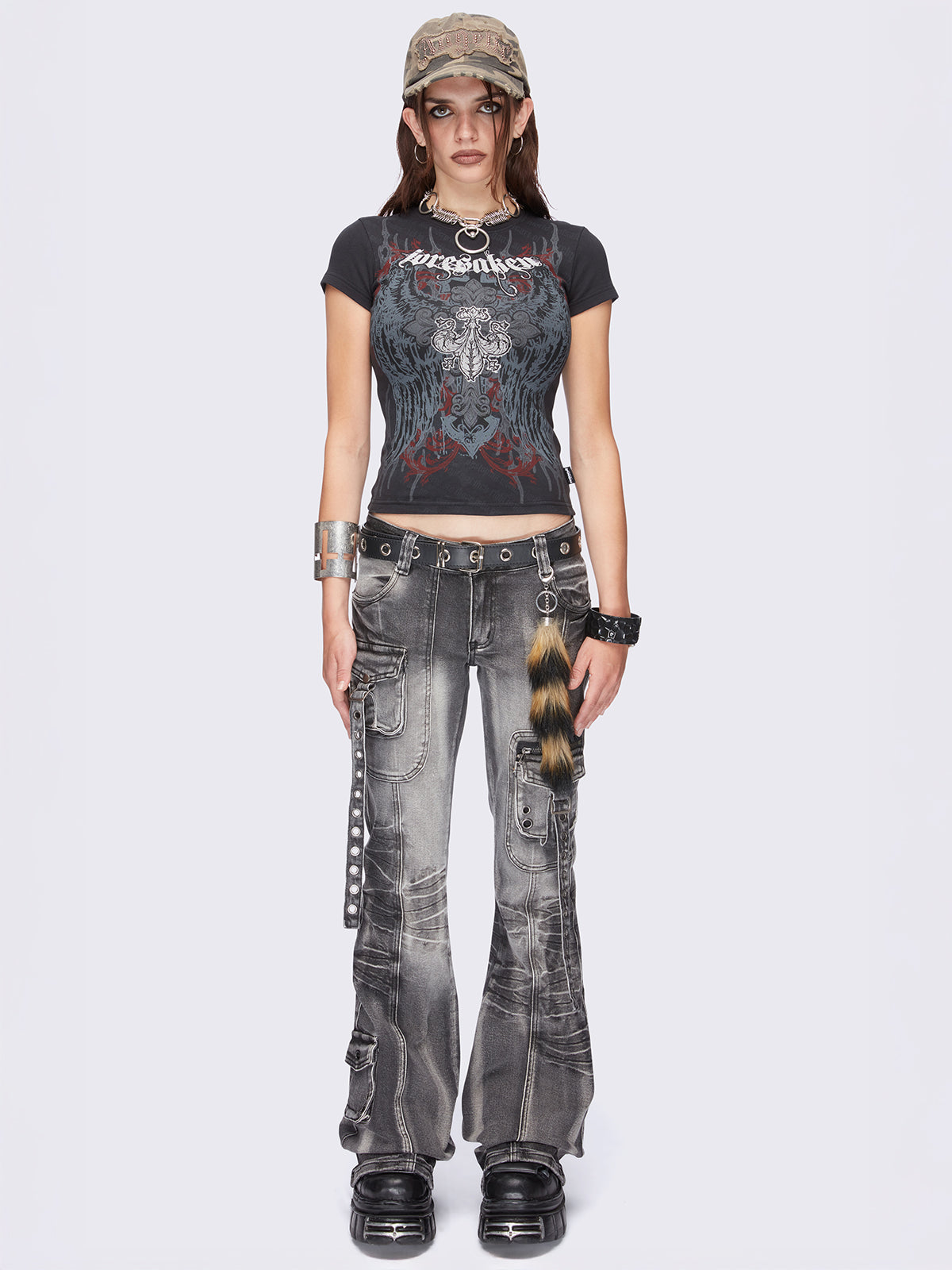 Black graphic baby tee with "Foresaken" and winged cross graphic print.