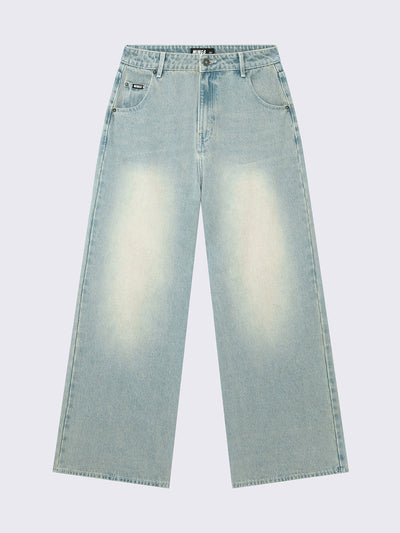 Baggy wide leg jeans in washed light blue with bege overdye wash