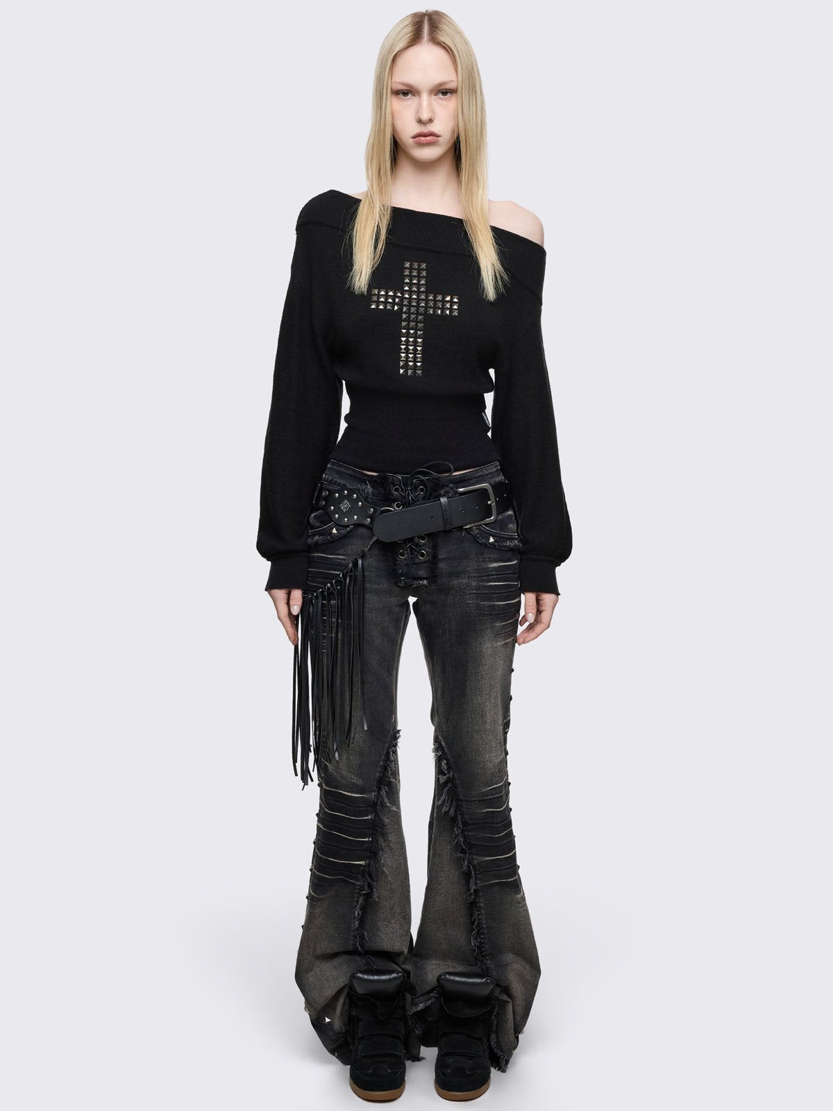 Black off-shoulder knitted sweater with studded cross front design.