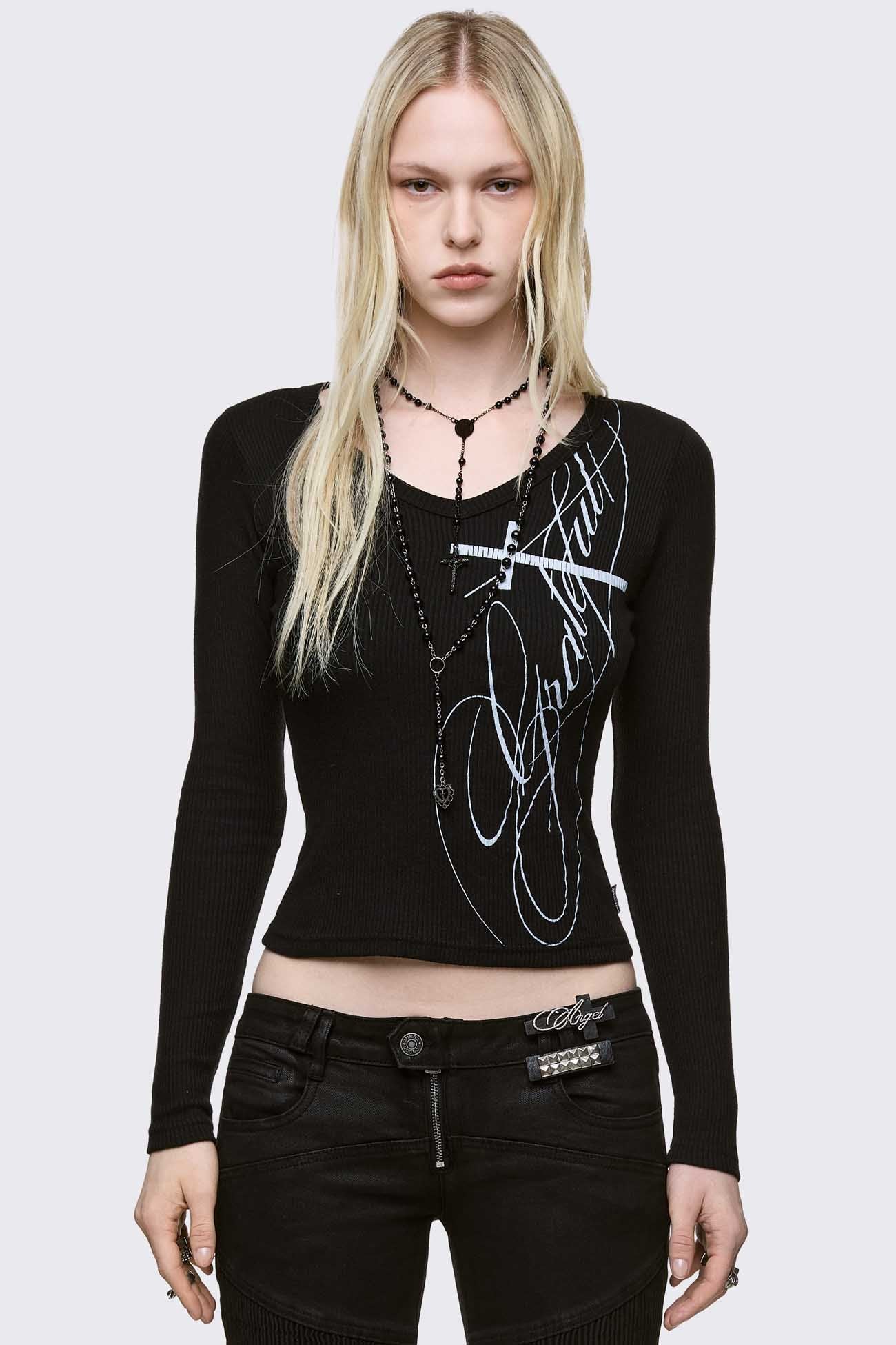 Black ribbed long sleeve top featuring "Grateful" cross graphic front print and v-neck.
