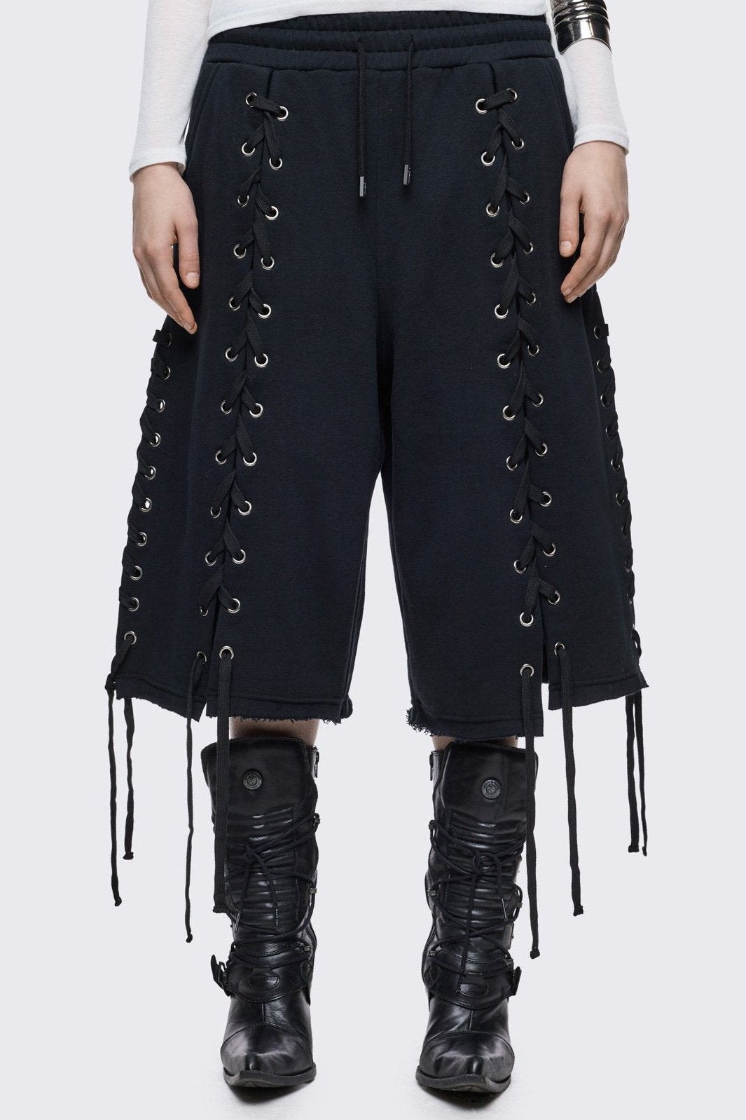 Black longline sweat shorts with open lace-up corset details