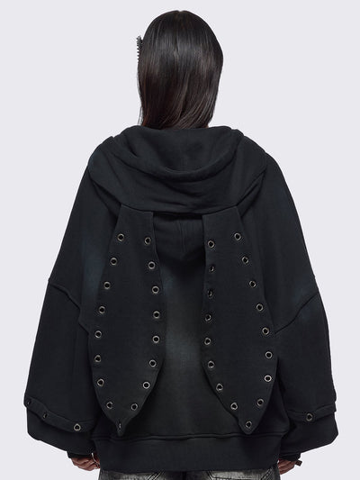 Black washed layered zip up hoodie with floppy ears hood, "Heaven" embroidery and silver eyelet details.