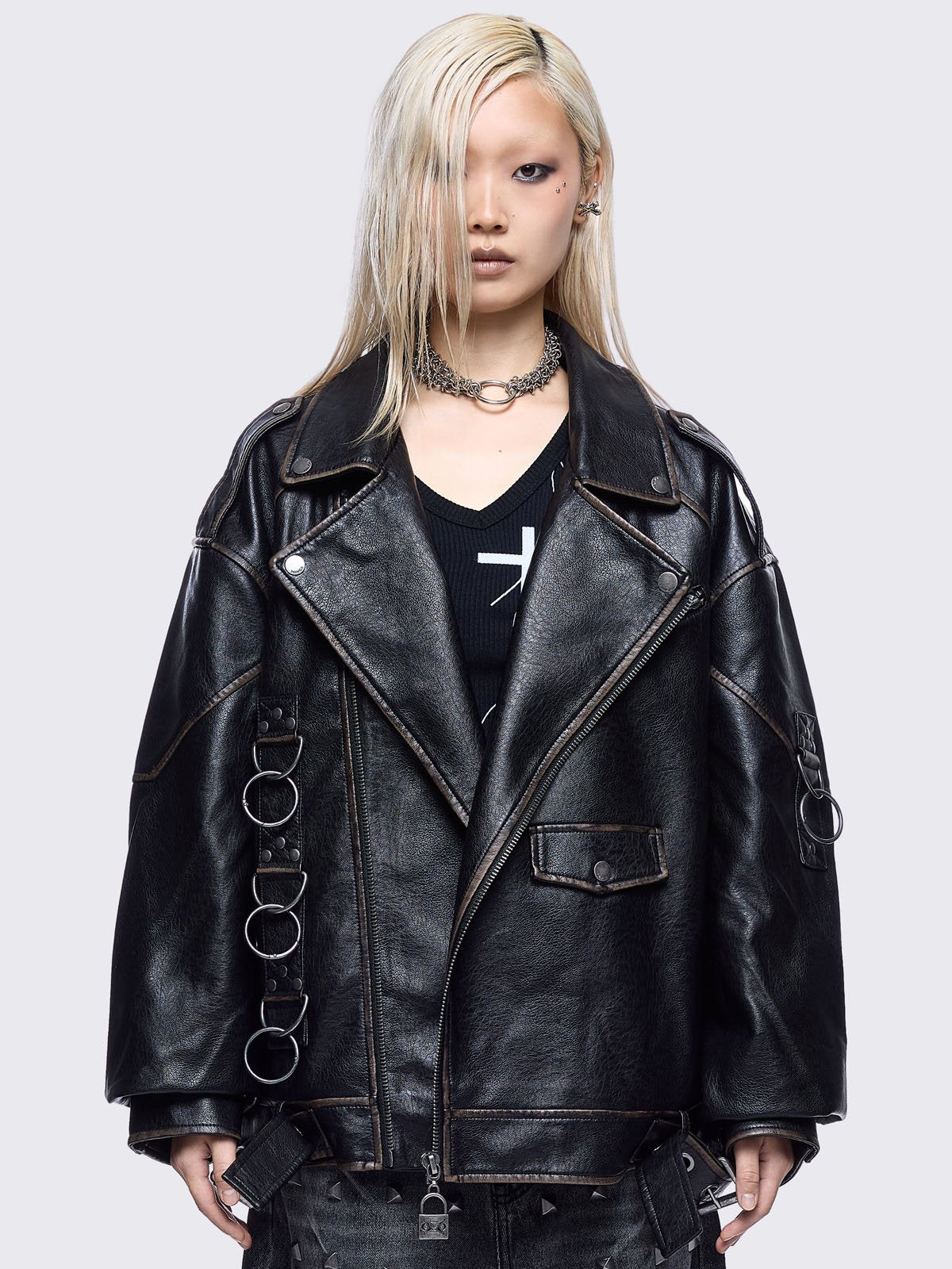 Black washed faux leather biker jacket with metal hardware details