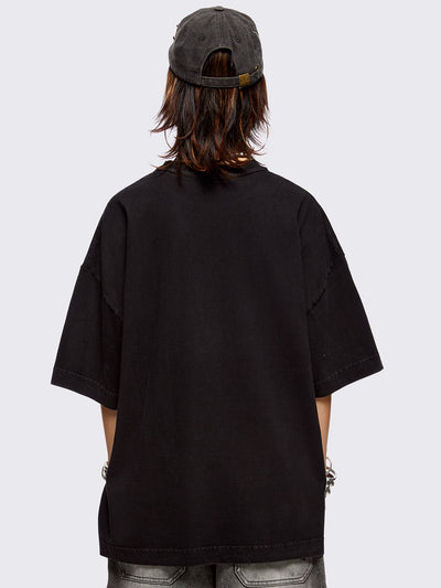 Black washed t-shirt with skulls and sword graphic front print and red embroidery.