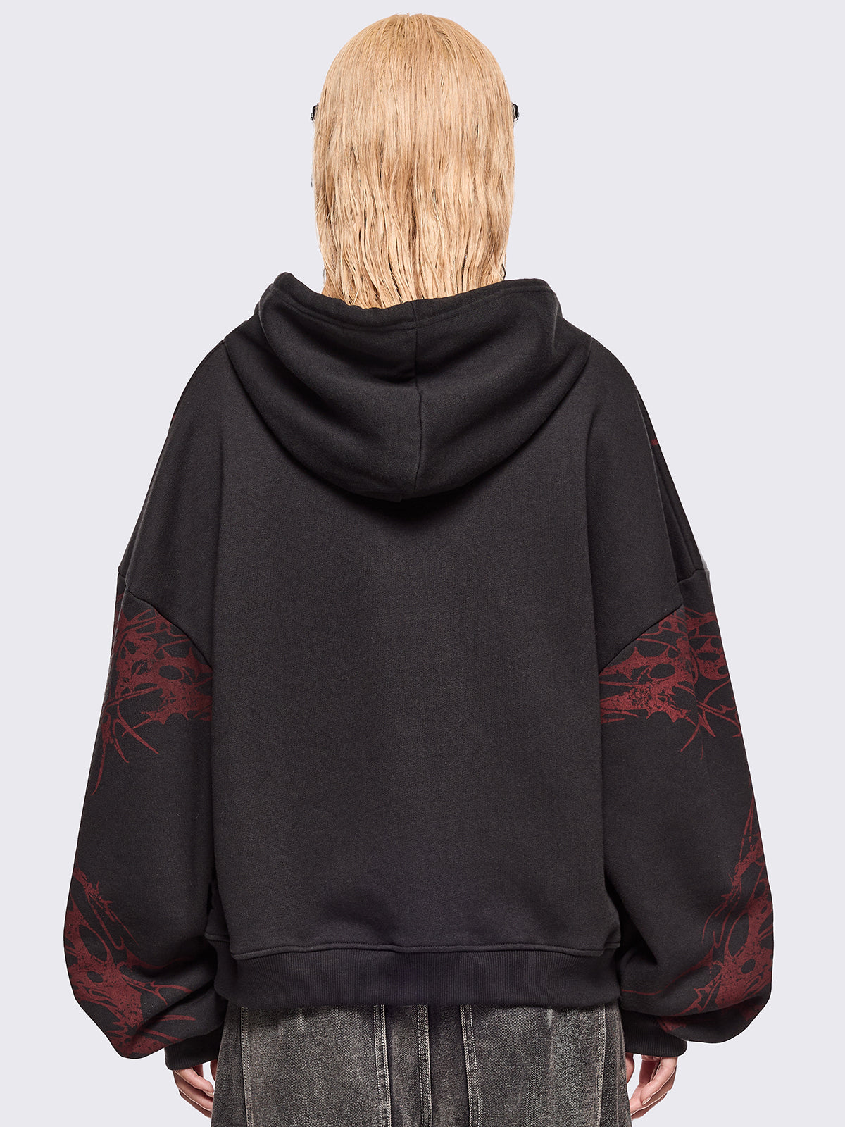 Black zip up hoodie jacket with red sigilism graphic front and sleeves print.