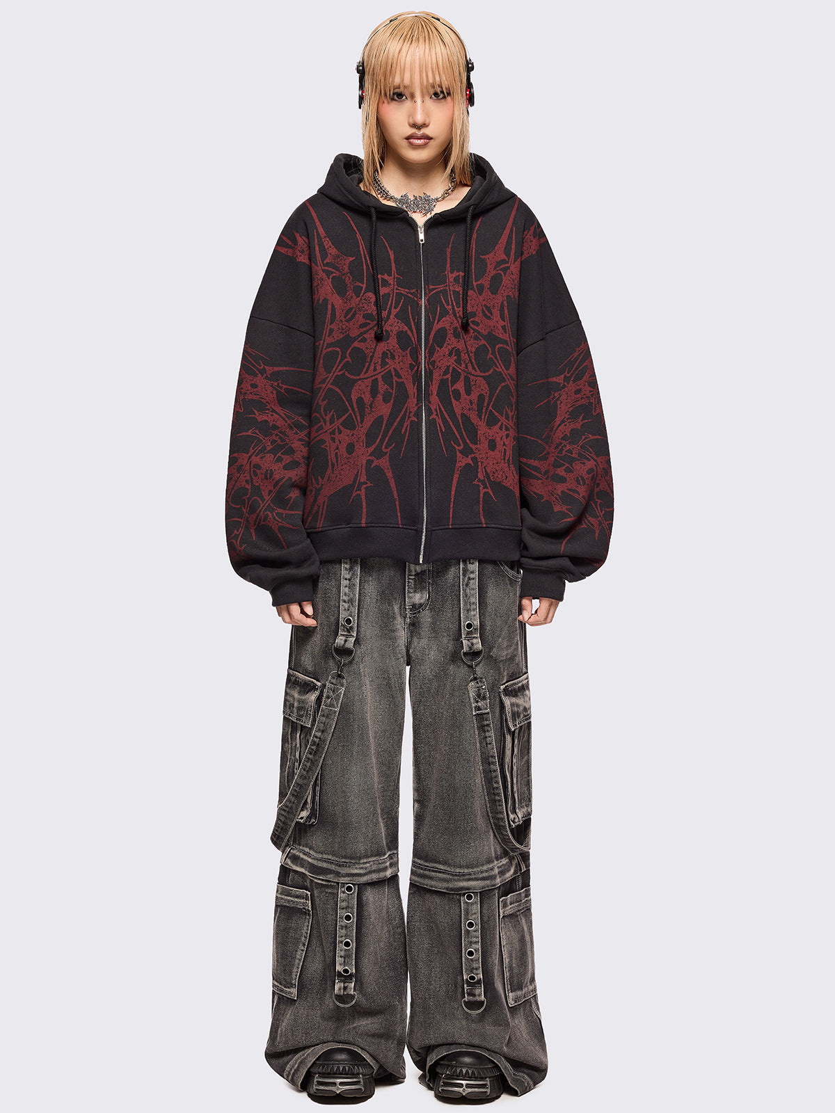 Black zip up hoodie jacket with red sigilism graphic front and sleeves print.