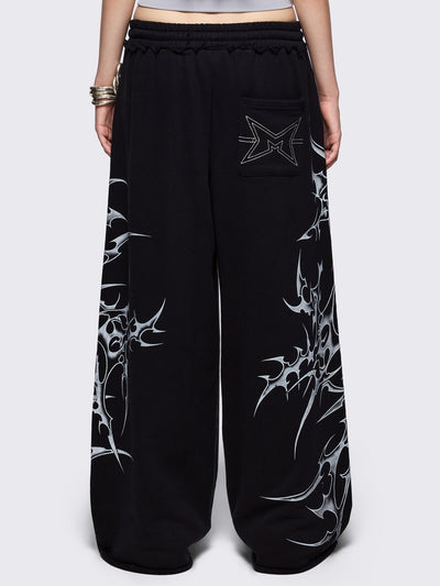 Black wide leg sweatpants with off-white sigilism graphic side print.