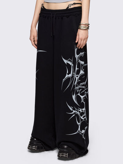 Black wide leg sweatpants with off-white sigilism graphic side print.