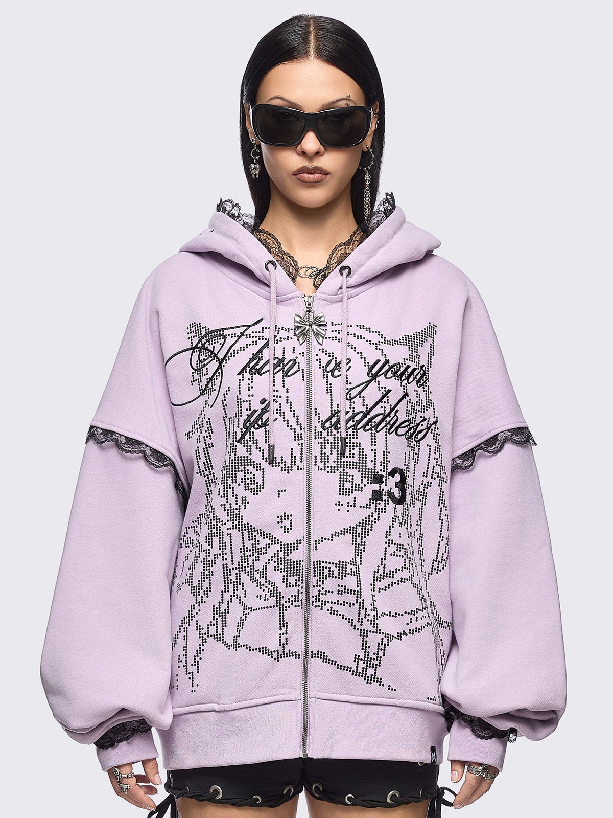 Pink zip up hoodie jacket with "I have your IP address" embroidery, anime girl ASCII-style graphic print and black lace seam details.