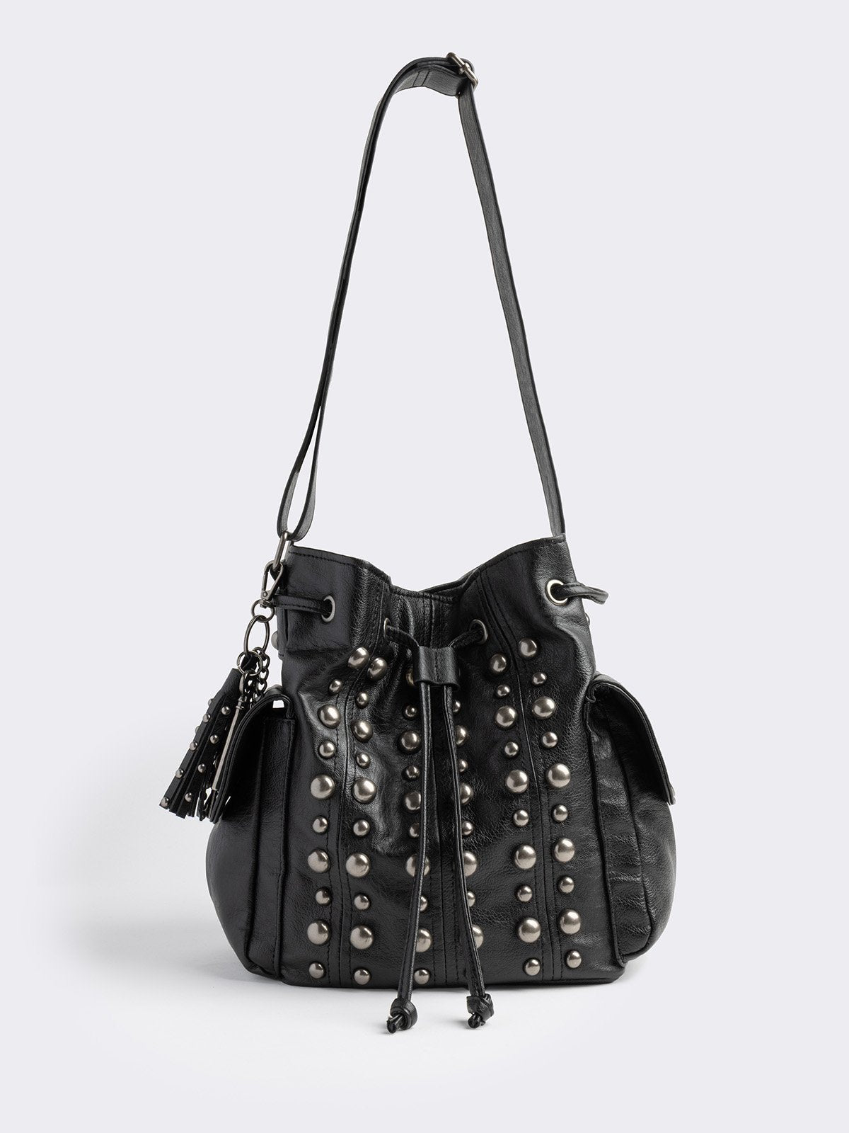Black faux leather bucket bag with removable charm keychain and silver stud details.  