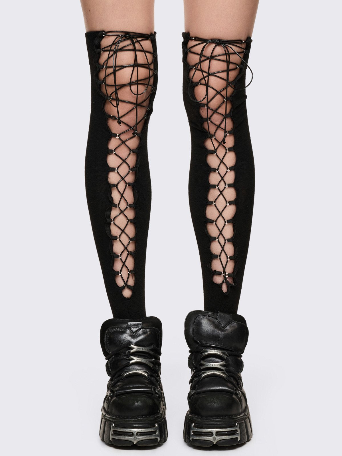 Black opaque thigh highs socks with front open lace-up details.