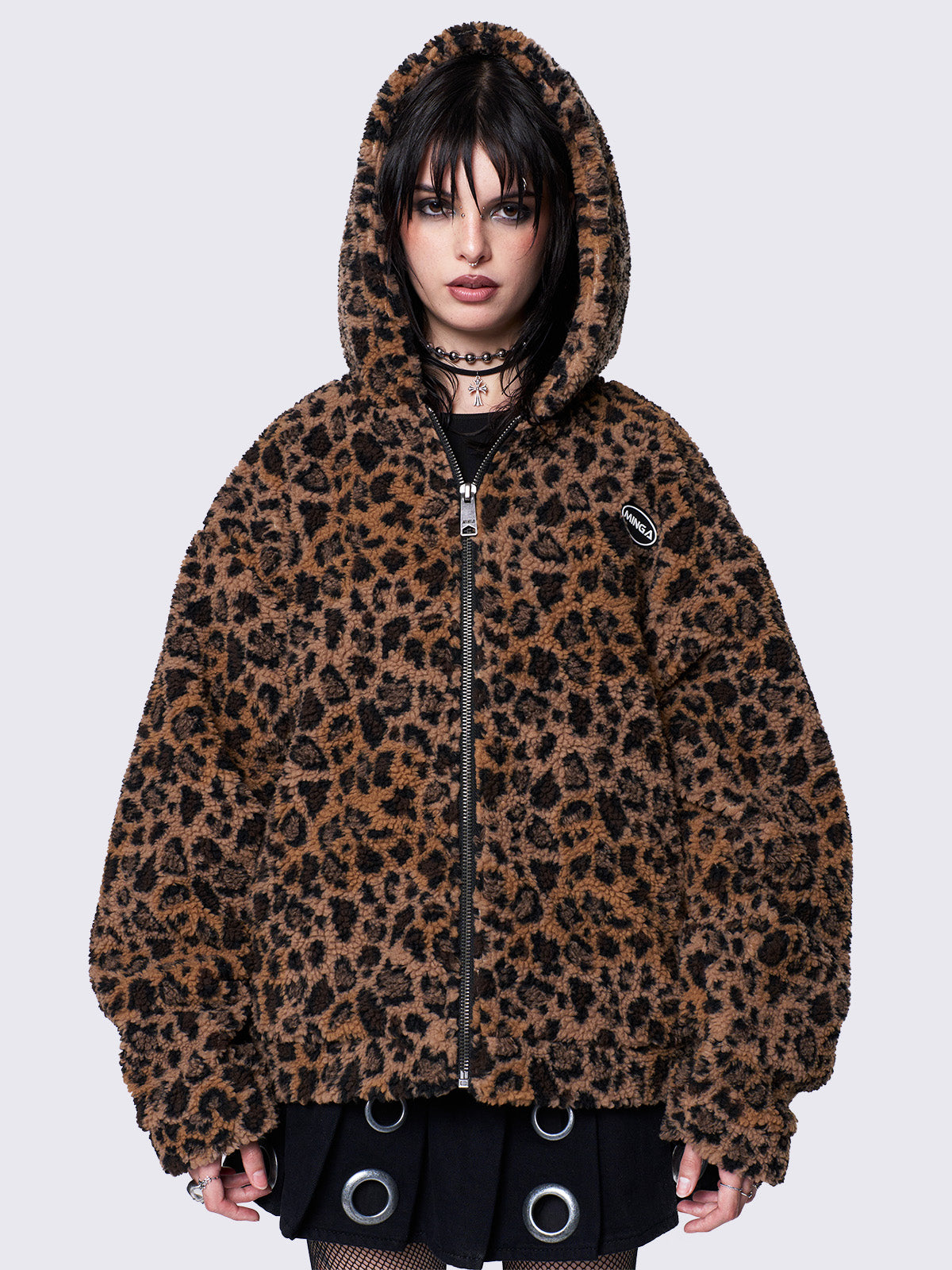 Leopard print borg fleece jacket with zip-up front, hood, and oversized fit. Ideal for indie sleaze and Y2K-inspired streetwear.