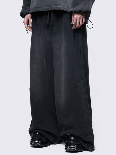 Baggy wide leg joggers in washed black with elasticated drawstring waist. 