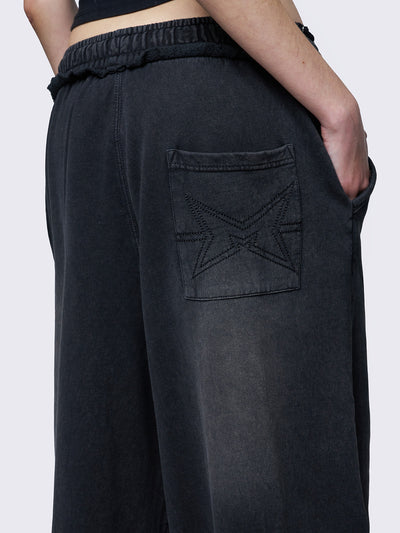 Baggy wide leg joggers in washed black with elasticated drawstring waist. 