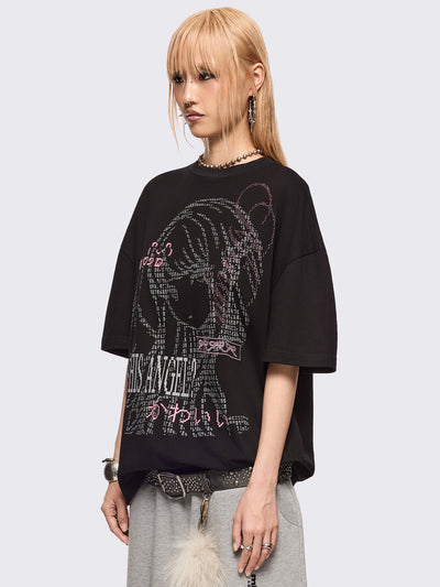 Black oversized t-shirt with "Seen this angel?" and a girl angel graphic print and pink stud and embroidery details.