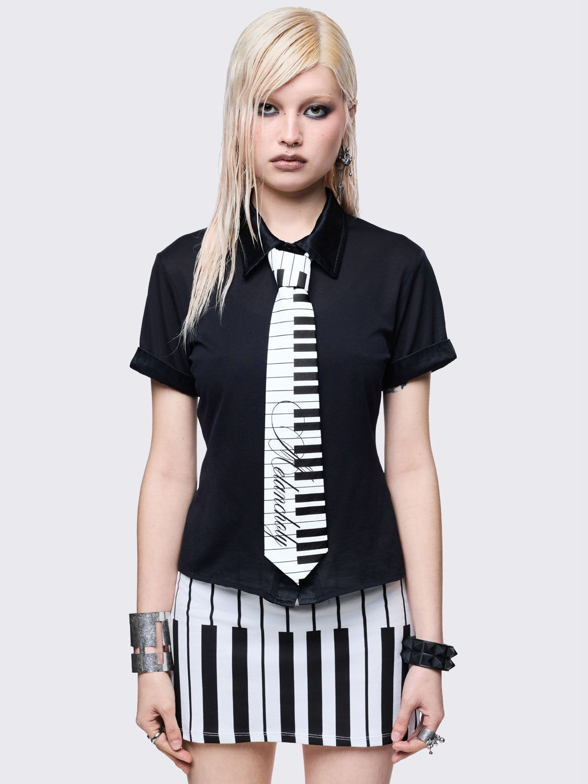 Black and white tie with graphic print.