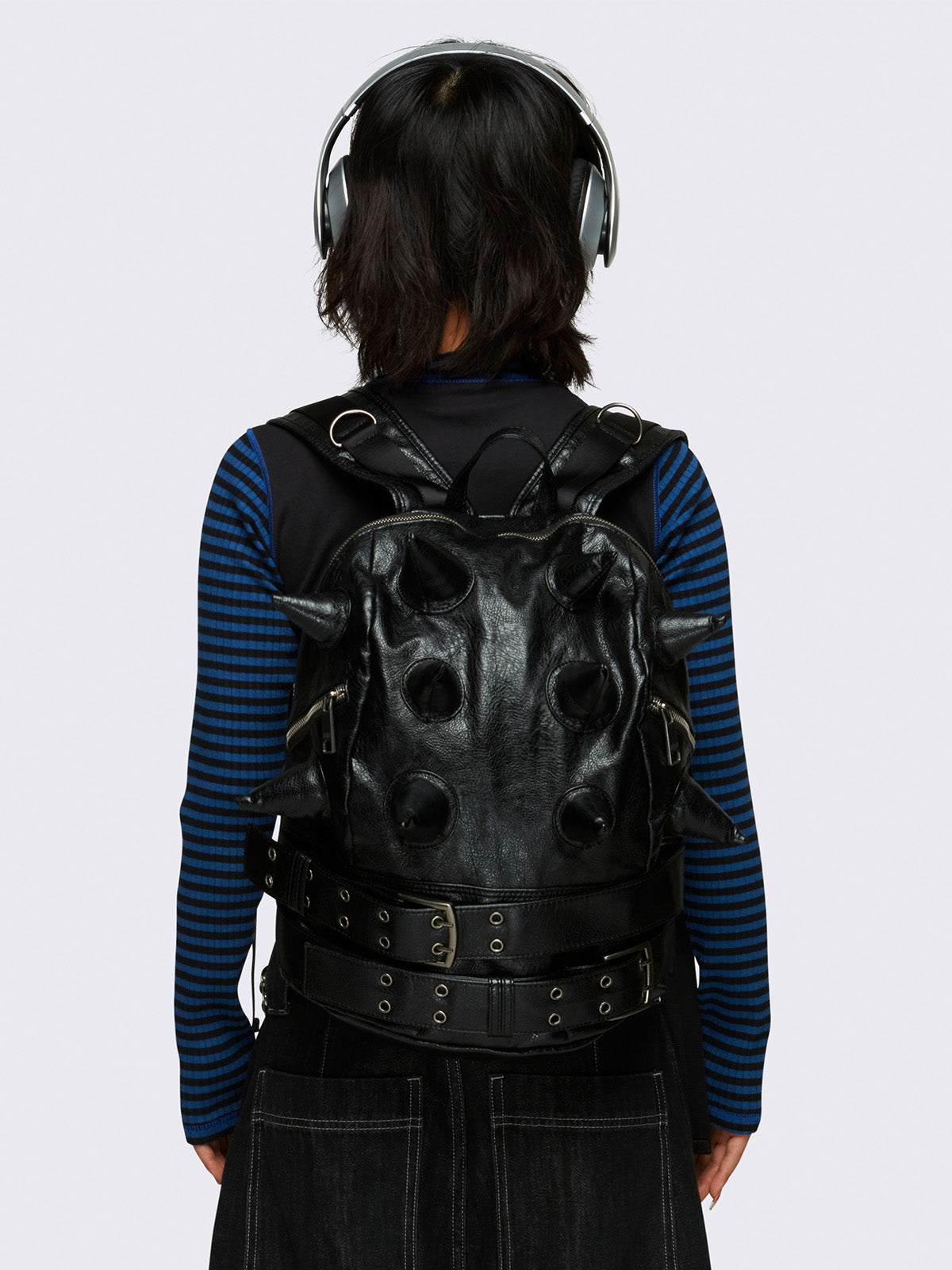 Vegan leather backpack in black with 3D spikes and buckles details