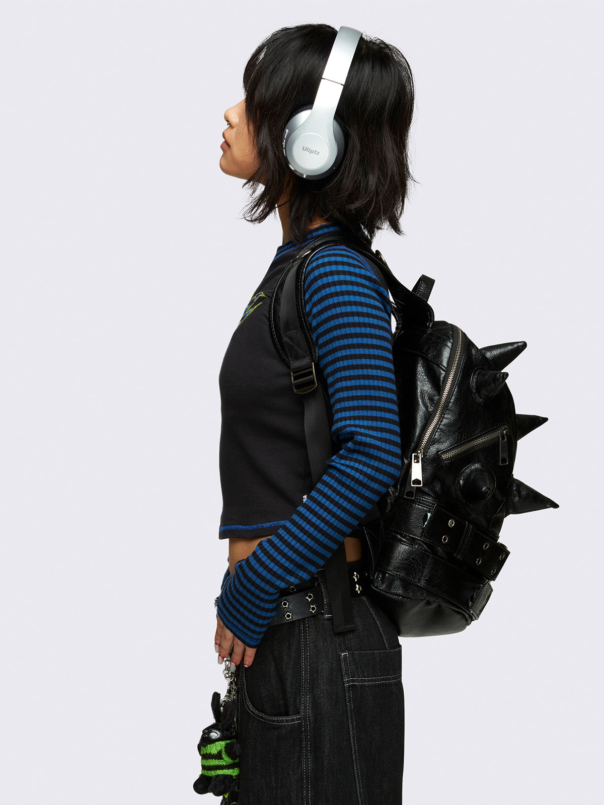 Vegan leather backpack in black with 3D spikes and buckles details