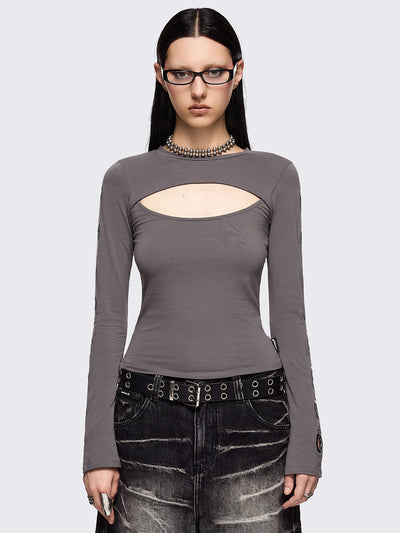 Grey cut-out long sleeve top with chunky silver eyelets on sleeves.
