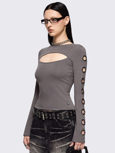Grey cut-out long sleeve top with chunky silver eyelets on sleeves.