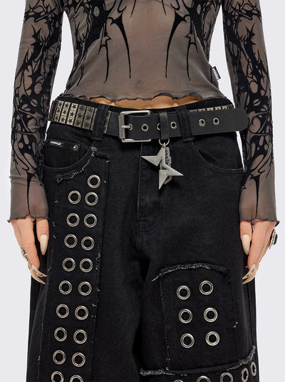 Black vegan leather buckle belt with silver studs in star design. 