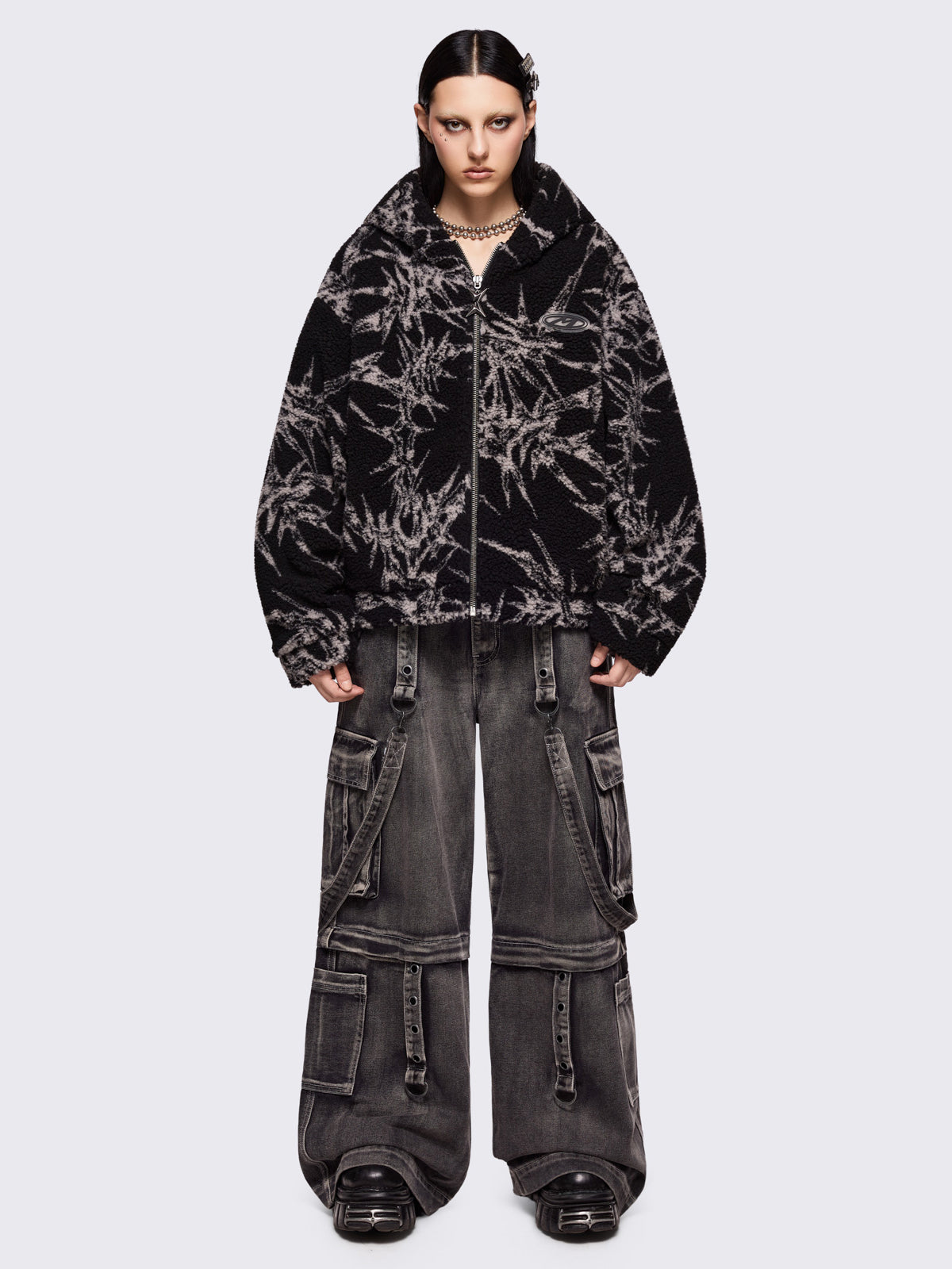 Black fleece borg hoodie jacket with all over grey thorns design.