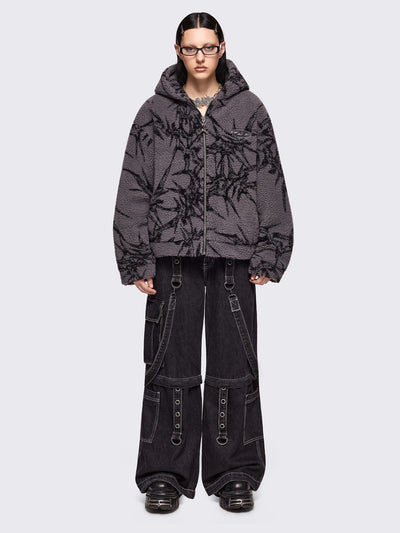 Grey fleece hoodie jacket featuring all over black thorns design.