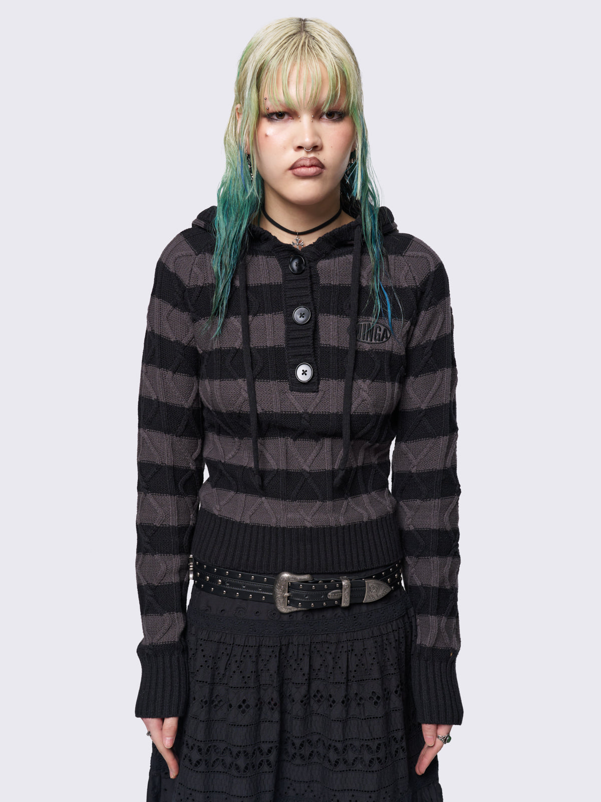 Cable-knit hooded jumper with grey and black stripes, featuring a half-button placket for added detail.