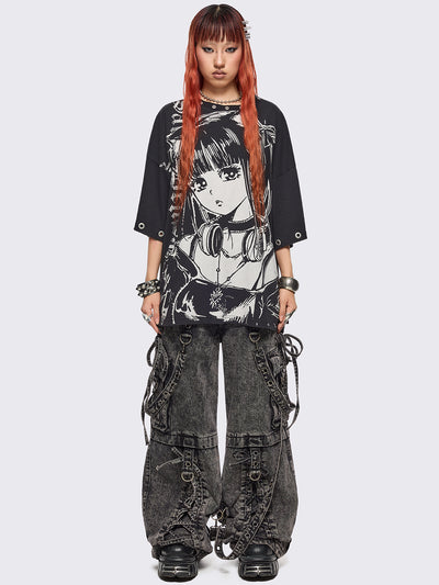 Black oversized t-shirt with anime girl graphic front print and silver eyelets trims.