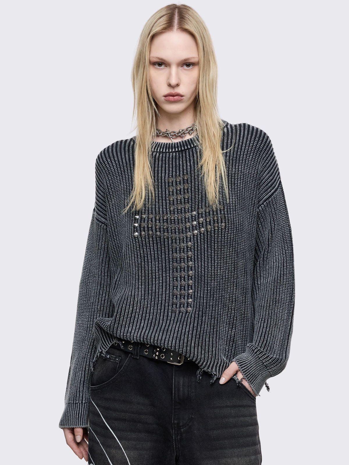 Black marl knit jumper with spiked cross design on front. 