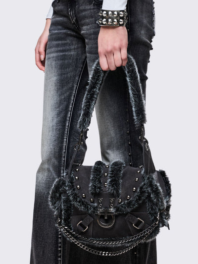 Black vegan shoulder bag with black and grey faux frosted fur and silver stud and hardware details 