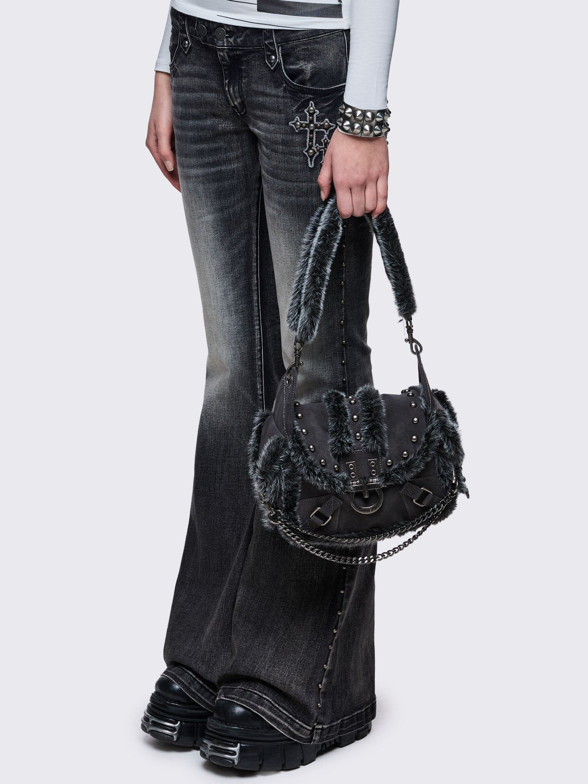 Black vegan shoulder bag with black and grey faux frosted fur and silver stud and hardware details 