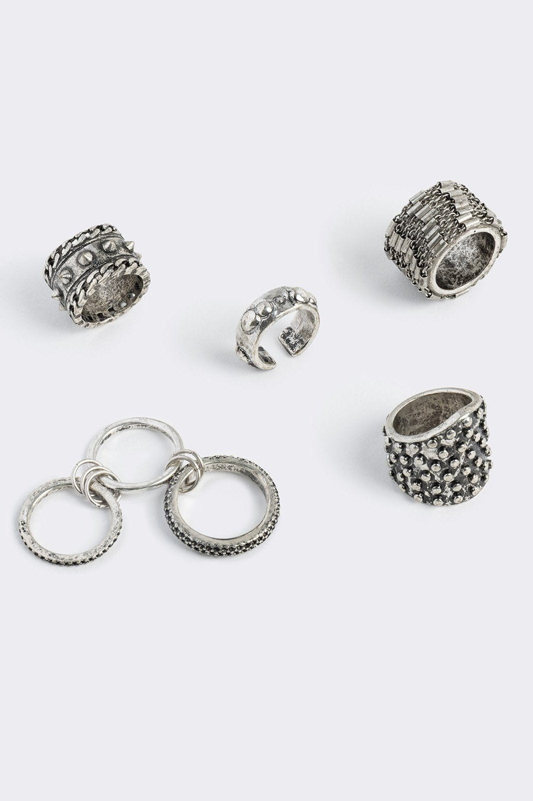 Set of 5 silver chunky rings.