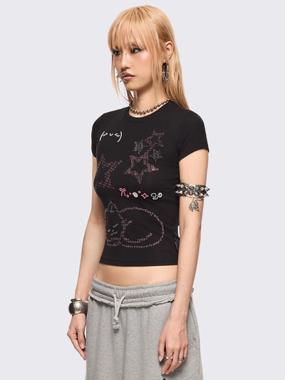 Black baby tee with kitty and stars graphic with stud and embroidery details.