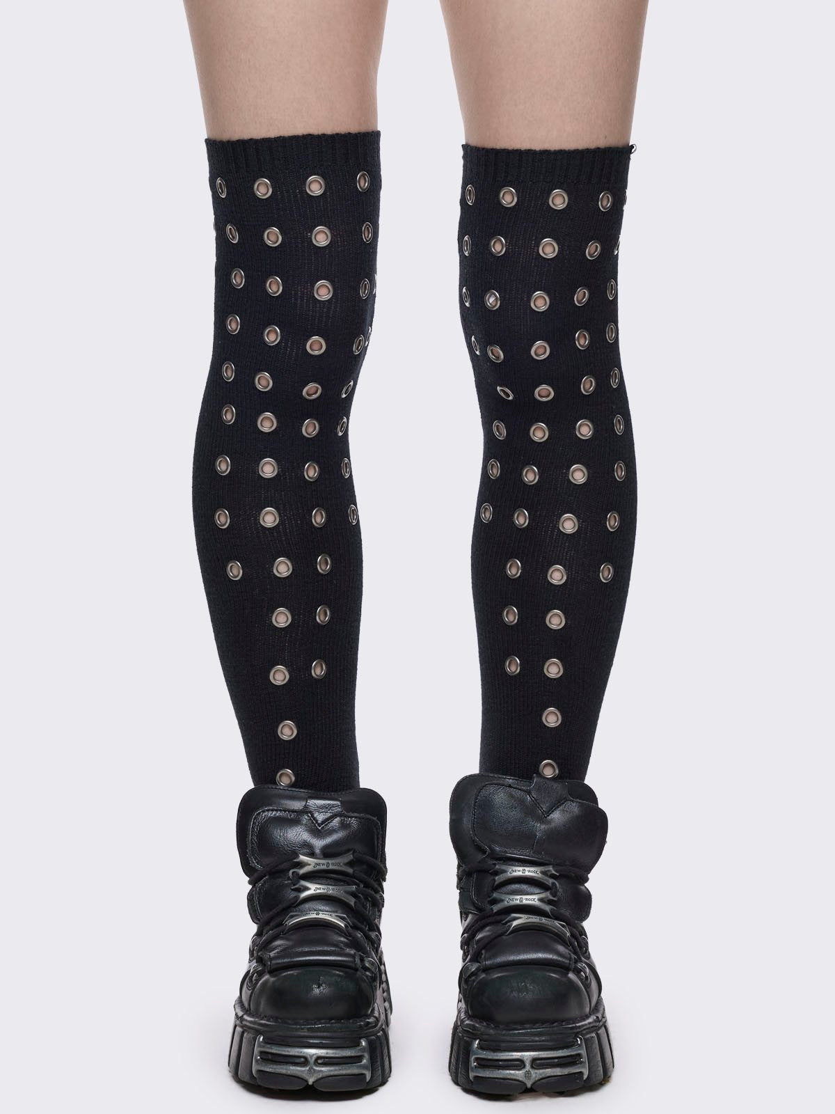 Black opaque thigh highs socks with all over silver eyelets. 