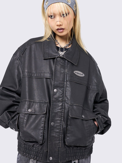 Black washed faux leather bomber jacket featuring a boxy oversize fit.