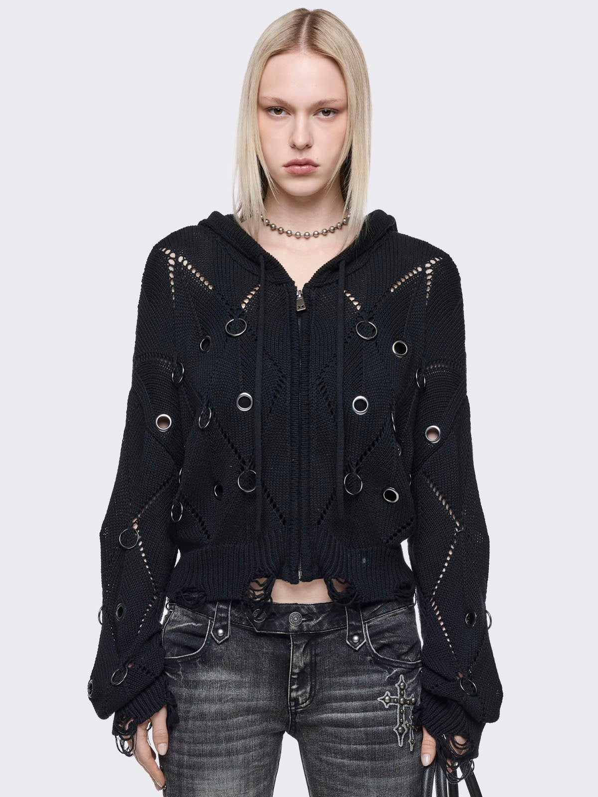 Black hood knitted cardigan with silver eyelets, o-ring, open-weave and distressed rib details.