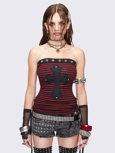 Black and red striped tube top with cross patch featuring stud details, eyelet grommet trim and ruched tie side detail. Grunge goth aesthetic. 