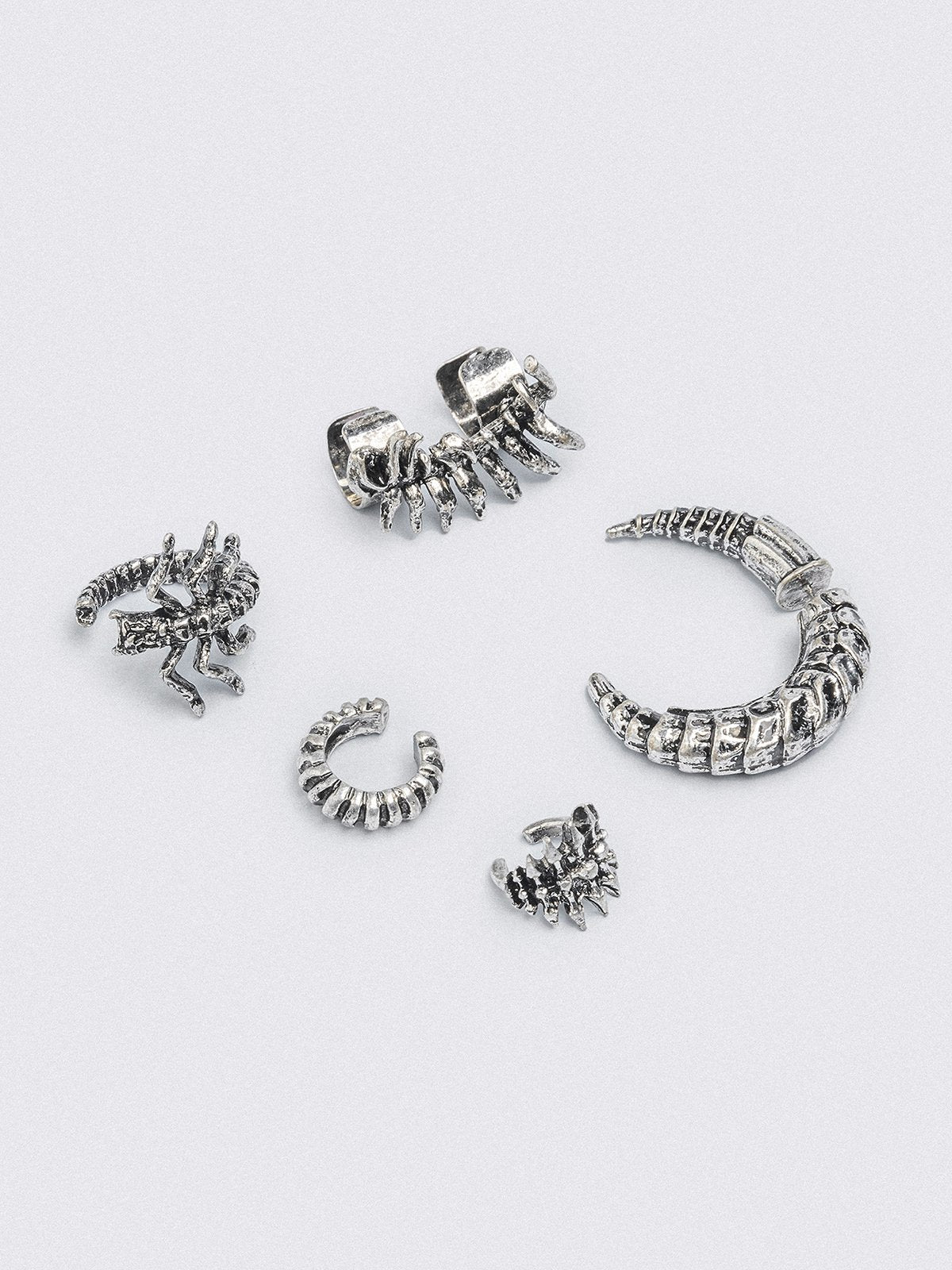 Silver 5 pc chunky earring set with centipede and spine designs. Chunky ear cuffs style.