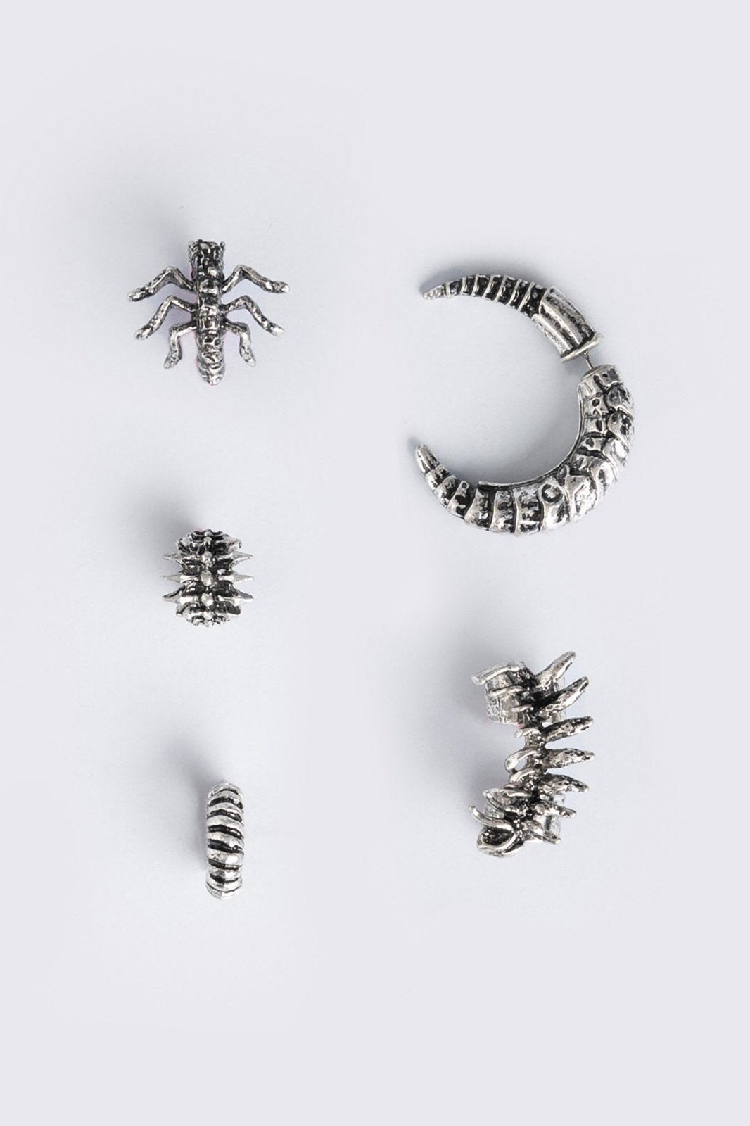 Silver 5 pc chunky earring set with centipede and spine designs. Chunky ear cuffs style.