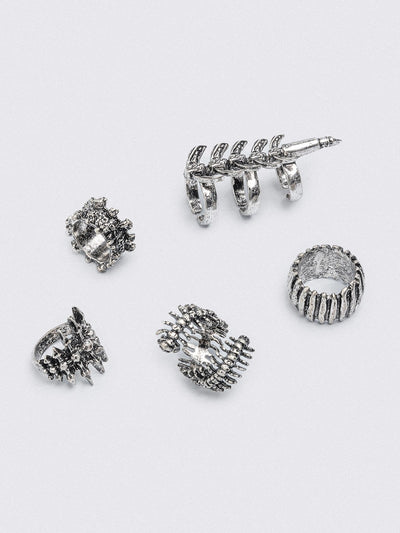 Set of 5 silver rings with centipede, spine and spike designs. 