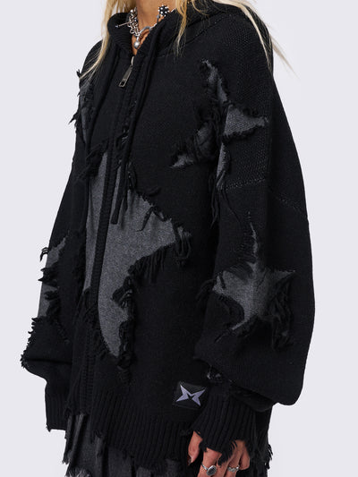 Hooded knit cardigan in black with frayed stars design in grey and distressed rib details.