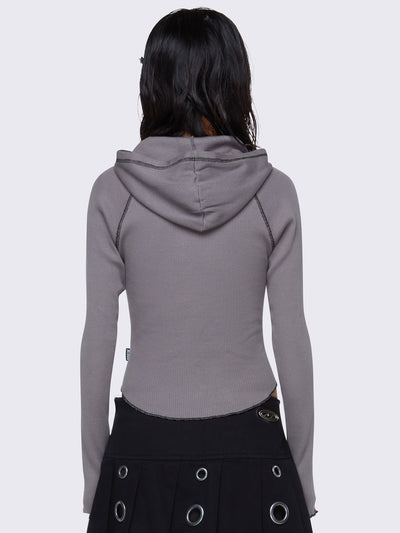 Hooded top in grey, with front star patch in black, contrast stitching in black and half button placket