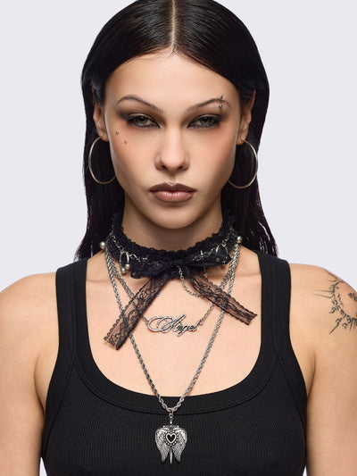 Set of 3 necklaces, black lace bow choker with piercings and chain  and "Angel" tag and winged heart pendants.
