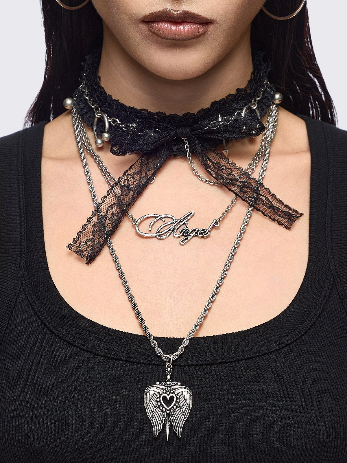 Set of 3 necklaces, black lace bow choker with piercings and chain  and "Angel" tag and winged heart pendants.