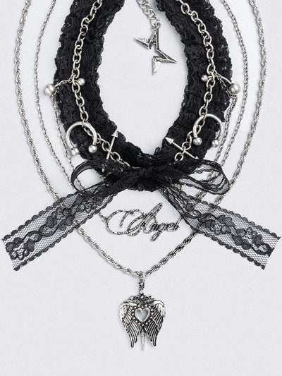 Set of 3 necklaces, black lace bow choker with piercings and chain  and "Angel" tag and winged heart pendants.