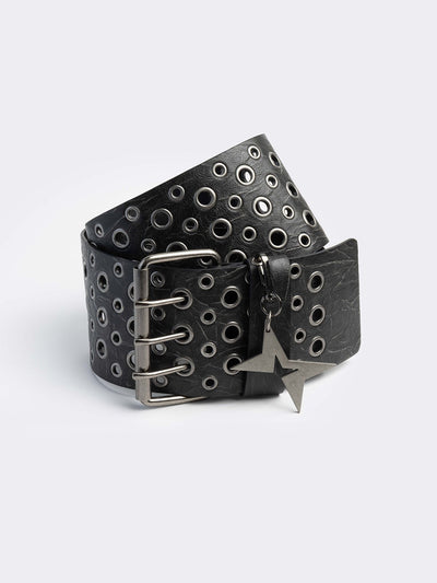 Wide black faux leather belt with multiple silver grommets/eyelets across the width, secured by a large triple-pin buckle, with a detachable star charm.
