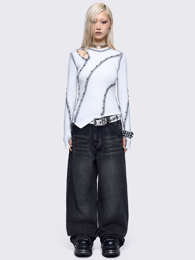 Off-white asymmetric top featuring cut out, contrast seam and stud details and thumbhole cuffs.